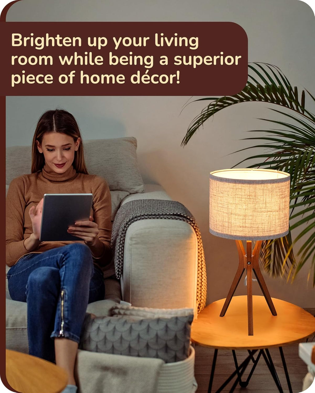 Mid-century style table lamp — featuring a dark wood base and a beige linen shade.
